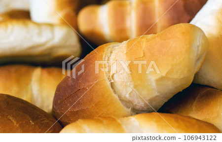 Croissant bread, food and bakery of rolls from cooking, catering service, breakfast or baking meal at cafe. Closeup of fresh baked, bun or roll snack for eating, nutrition or fiber in the restaurant Croissant bread, food and bakery of rolls from cooking, catering service, breakfast or baking meal at cafe. Closeup of fresh baked, bun or roll snack for eating, nutrition or fiber in the restaurant 106943122