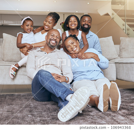 Portrait, big family and african american people bonding with love, care and affection in a family home. Generations, grandmother and grandfather with children and parents at home while relaxing Portrait, big family and african american people bonding with love, care and affection in a family home. Generations, grandmother and grandfather with children and parents at home while relaxing 106943368
