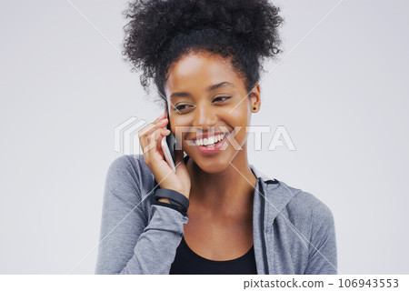 Phone call, smile and black woman speaking in studio isolated on a white background with mockup. Cellphone, happy and African female person in communication, conversation or discussion with contact. Phone call, smile and black woman speaking in studio isolated on a white background with mockup. Cellphone, happy and African female person in communication, conversation or discussion with contact. 106943553