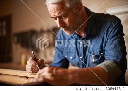 Carpentry, furniture manufacturing and man with pencil, focus and wood design workshop at small business. Creativity, thinking and professional, senior carpenter working on wooden designer project. Carpentry, furniture manufacturing and man with pencil, focus and wood design workshop at small business. Creativity, thinking and professional, senior carpenter working on wooden designer project. 106943841