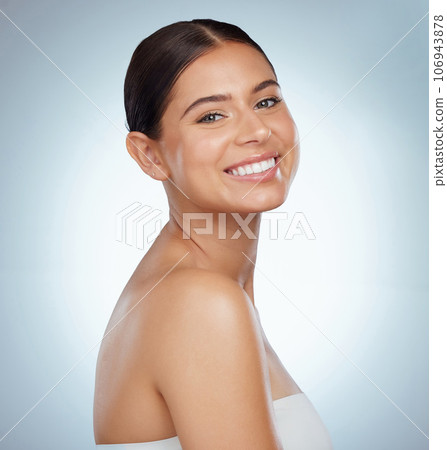 Face, skincare and happy woman in studio isolated on a white background. Portrait, natural beauty and female model in makeup, cosmetics or spa facial treatment for skin health, aesthetic or wellness. 106943878