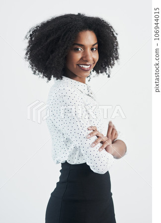 Business, happy and portrait of black woman with arms crossed in studio isolated on a white background. Confidence, face and African female professional, entrepreneur or person from South Africa. 106944015