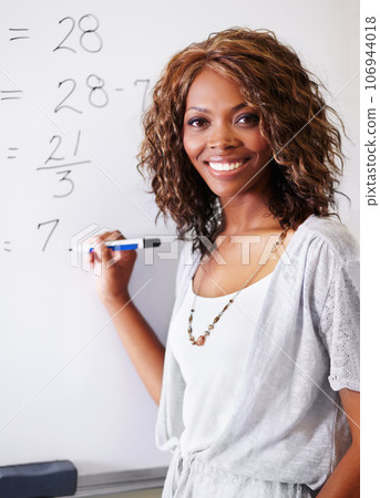 Mathematics, teacher and portrait of black woman on whiteboard with pride for career or job in classroom. Smile, education and female educator on board from South Africa teaching math at school. 106944018
