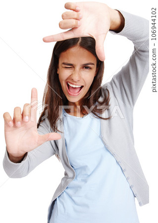 Business woman, framing face and portrait of a person holding hands with a smile. White background, isolated and vertical frame of a female employee in a studio with mock up making a image hand sign 106944102