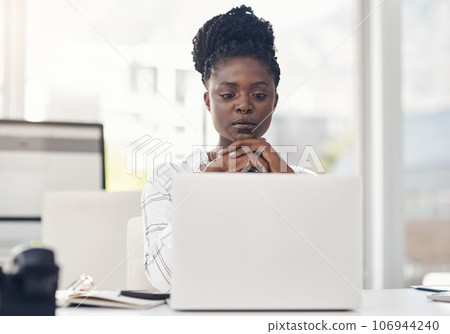Business, woman and reading on a laptop with internet in africa for entrepreneurship for a company. Professional female, computer and focus for research for working online at a startup or office. 106944240