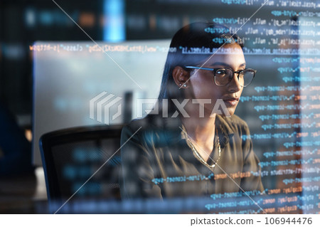 Computer, hologram and woman coding for data analysis, information technology overlay and night html. Programmer or IT person in glasses reading software script, programming or cybersecurity research Computer, hologram and woman coding for data analysis, information technology overlay and night html. Programmer or IT person in glasses reading software script, programming or cybersecurity research 106944476