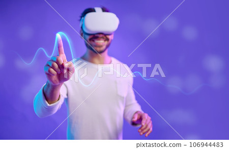 Futuristic, hand and virtual reality, man and screen touch, metaverse and technology innovation in studio. Digital transformation, ux and gaming, cyber tech overlay and vr goggles with mockup space Futuristic, hand and virtual reality, man and screen touch, metaverse and technology innovation in studio. Digital transformation, ux and gaming, cyber tech overlay and vr goggles with mockup space 106944483