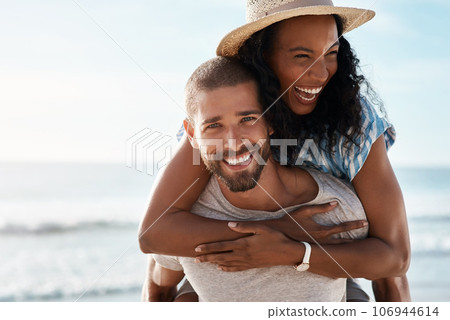 Sea, piggyback and portrait of happy couple with sky, waves and romantic summer sea holiday for travel with space. Love, man and woman at beach with mockup, adventure and vacation together on island. Sea, piggyback and portrait of happy couple with sky, waves and romantic summer sea holiday for travel with space. Love, man and woman at beach with mockup, adventure and vacation together on island. 106944614