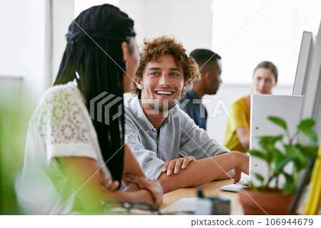 Happy man, chat or people in office on break talking, chatting or speaking of gossip news together. Bonding, smile or relaxed employees in conversation or discussion about on blog or article at desk 106944679