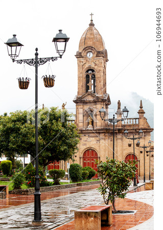 Beautiful central square and the San Jeronimo Parish Temple of the small town of Nobsa well known for the traditional handmade ruanas in the region of Boyaca in Colombia Beautiful central square and the San Jeronimo Parish Temple of the small town of Nobsa well known for the traditional handmade ruanas in the region of Boyaca in Colombia 106944693