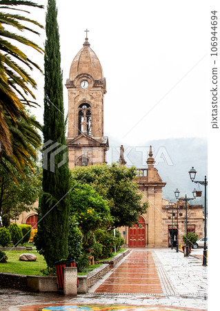 Beautiful central square and the San Jeronimo Parish Temple of the small town of Nobsa well known for the traditional handmade ruanas in the region of Boyaca in Colombia 106944694