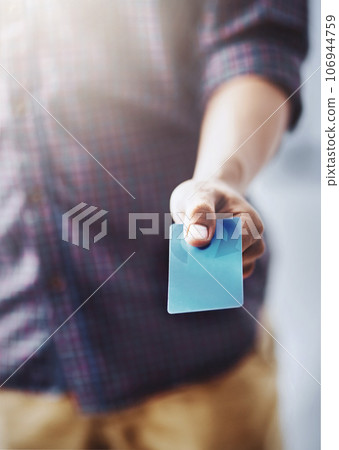 Man, hand and credit card for payment, checkout or purchase product at retail shop or store. Closeup of male person, hands or customer showing debit for shopping, transaction or banking to pay 106944759