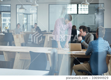 Manager, teamwork or business people in startup planning to design a project for collaboration. Laptop, online or mentor training, teaching or coaching employees for digital research behind glass 106944929