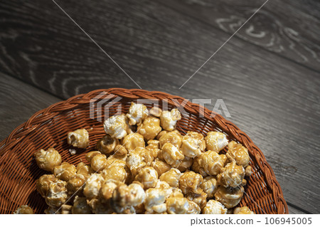 Caramel corn with peanuts and room for text. Caramel corn with peanuts and room for text. 106945005