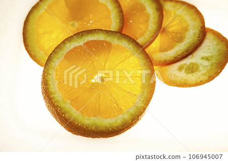 Macro of fresh orange slices. Macro of fresh orange slices. 106945007