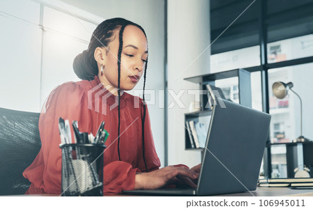 Business woman, laptop and office for online admin management, Human Resources research and planning. Professional african person or HR worker typing on computer, company email or schedule check 106945011