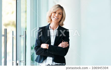 Trust me, Im a psychologist. Portrait of a confident mature psychologist working in a modern office. Trust me, Im a psychologist. Portrait of a confident mature psychologist working in a modern office. 106945304