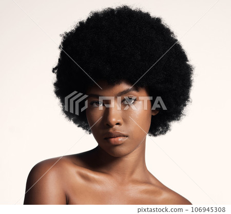 Natural beauty, skin care and portrait of black woman with afro, cosmetics and dermatology on white background. Skincare, studio and African model with serious face, salon makeup glow and wellness. Natural beauty, skin care and portrait of black woman with afro, cosmetics and dermatology on white background. Skincare, studio and African model with serious face, salon makeup glow and wellness. 106945308