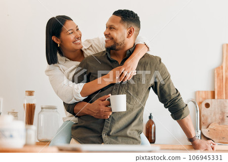 Happy, coffee and loving couple bonding and having fun while spending time together at home. Smiling, in love and carefree couple hugging and sharing a romantic moment while enjoying the weekend Happy, coffee and loving couple bonding and having fun while spending time together at home. Smiling, in love and carefree couple hugging and sharing a romantic moment while enjoying the weekend 106945331