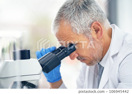 Microscope, science and face of man in laboratory for research, medical analysis and biotechnology. Professor, scientist and microbiology investigation of molecule, dna test or development of vaccine Microscope, science and face of man in laboratory for research, medical analysis and biotechnology. Professor, scientist and microbiology investigation of molecule, dna test or development of vaccine 106945442