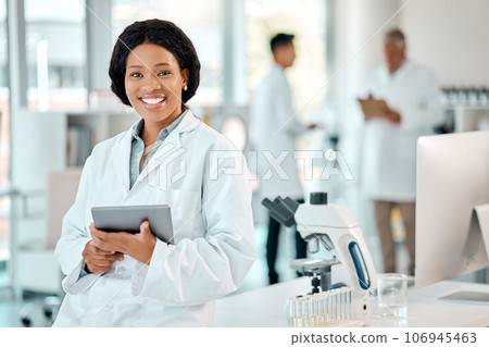 Tablet, black woman and portrait of a scientist in laboratory, hospital or science research for medicine, chemistry or innovation. Doctor, technology and medical worker with smile in clinic or lab 106945463