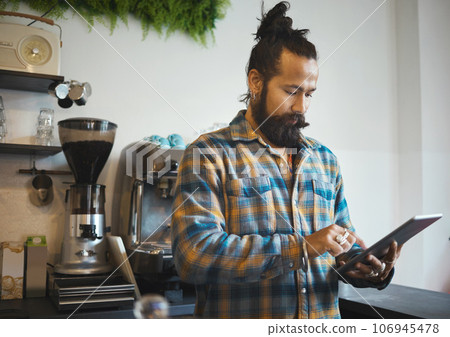 Tablet work, barista and cafe owner working on digital retail shop design for business. Coffee shop waiter, ecommerce and man planning a restaurant web page for online shopping and networking 106945478