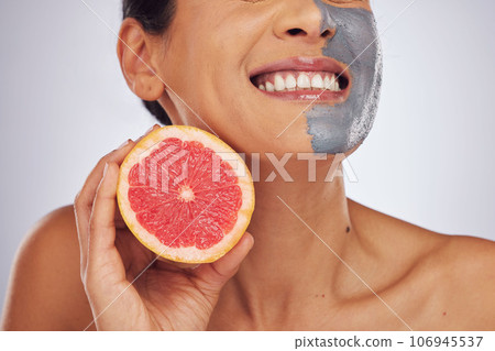 Skincare, grapefruit and woman with a face mask with charcoal, clay or natural beauty product for wellness, detox or nutrition. Fruit, healthy cosmetics and girl happy with vitman c or facial care Skincare, grapefruit and woman with a face mask with charcoal, clay or natural beauty product for wellness, detox or nutrition. Fruit, healthy cosmetics and girl happy with vitman c or facial care 106945537