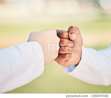 Sports, teamwork and hands for fist bump on field for motivation, support and solidarity outdoors. Thank you greeting, collaboration and hand connection for success, goals and target for competition Sports, teamwork and hands for fist bump on field for motivation, support and solidarity outdoors. Thank you greeting, collaboration and hand connection for success, goals and target for competition 106945568
