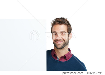 Portrait, studio and man with a board with mockup space for marketing, advertising or product placement. Happy, smile and male model with a banner, poster or signage isolated by a white background. 106945795