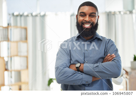 Happy, portrait and a black man with arms crossed in an office for corporate and management business. Smile, working and an African accountant with pride and confidence in job and a finance company 106945807