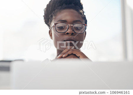 Thinking, planning and business woman on computer for solution, research and serious, focus or job decision. Reading, review and choice of african person or analyst on laptop for data problem solving Thinking, planning and business woman on computer for solution, research and serious, focus or job decision. Reading, review and choice of african person or analyst on laptop for data problem solving 106946161
