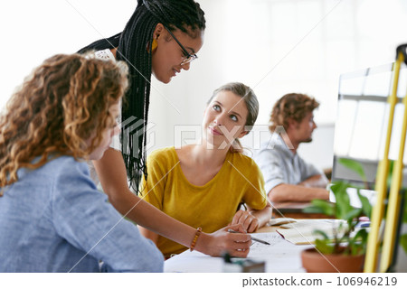 Woman, floor plan or engineering manager writing or planning project talking with leadership in meeting. Coaching women, teamwork or designers working on strategy of architecture blueprint in office 106946219