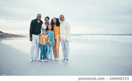 Portrait of grandparents, parents and children on beach enjoying holiday, travel vacation and weekend together. Big family, love and happy group smile for bonding, quality time and relax by ocean Portrait of grandparents, parents and children on beach enjoying holiday, travel vacation and weekend together. Big family, love and happy group smile for bonding, quality time and relax by ocean 106946333