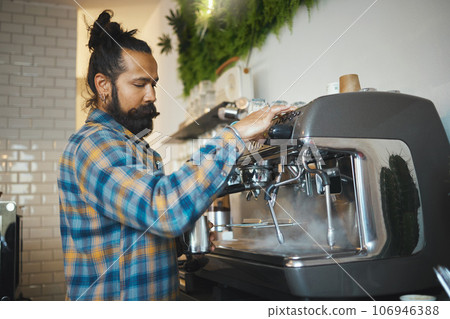 Man in cafe, barista working machine and create drink with focus and small business, workflow and process. Espresso, latte or cappuccino production, busy server in coffee shop with steam for cleaning Man in cafe, barista working machine and create drink with focus and small business, workflow and process. Espresso, latte or cappuccino production, busy server in coffee shop with steam for cleaning 106946388