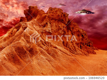 UFO, invasion and spaceship in outer space on mars and planet with science fiction. Alien technology, flying saucer and red mountain landscape with surreal background and world with spacecraft in sky 106946520
