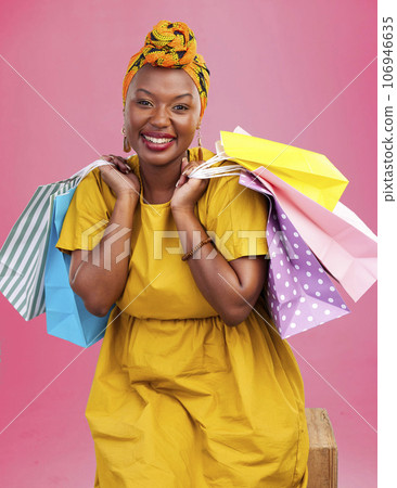 Shopping bag, studio portrait and happy black woman excited for discount promotion, boutique sales or commerce deal. Happiness, package gift or African customer with retail present on pink background Shopping bag, studio portrait and happy black woman excited for discount promotion, boutique sales or commerce deal. Happiness, package gift or African customer with retail present on pink background 106946635