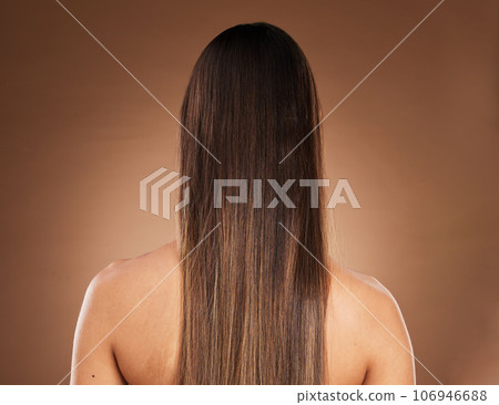 Hair care, beauty and back of woman for wellness, treatment and keratin glow on brown background. Salon aesthetic, hairdresser and girl with cosmetics, hairstyle texture and natural growth in studio Hair care, beauty and back of woman for wellness, treatment and keratin glow on brown background. Salon aesthetic, hairdresser and girl with cosmetics, hairstyle texture and natural growth in studio 106946688