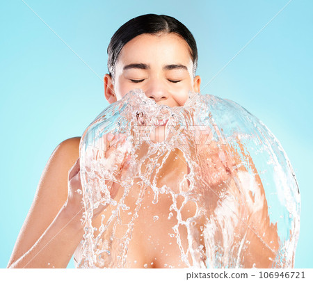 Do you have any hobbies Yes. Skincare. Shot of a beautiful young woman being splashed with water in the face against a blue background. Do you have any hobbies Yes. Skincare. Shot of a beautiful young woman being splashed with water in the face against a blue background. 106946721