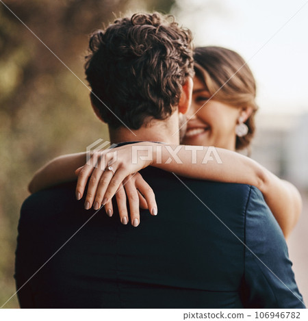 Couple hug outdoor, wedding and marriage with love and relationship commitment, partnership and respect. Life partner, happiness and groom with bride hands and ring, loyalty with happy people 106946782