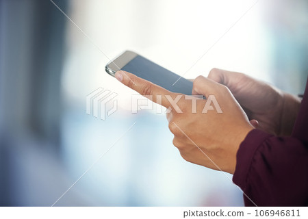 Phone, closeup or hands of woman in office on social media networking, chatting or texting message. News, surf or female employee typing, scrolling or checking emails online on digital mobile app Phone, closeup or hands of woman in office on social media networking, chatting or texting message. News, surf or female employee typing, scrolling or checking emails online on digital mobile app 106946811