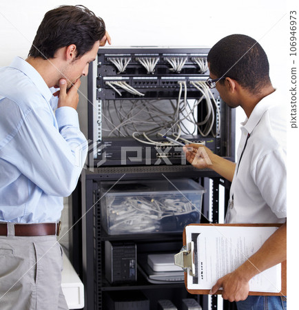 Information technology, men and wire in server room for maintenance, inspection and fixing. Cable, IT technician and fix computer for cybersecurity, networking or database repair in data center. 106946973