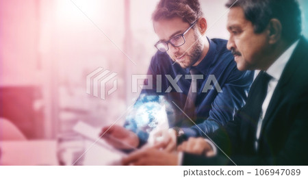 Hologram, tablet and team of business people with futuristic networking for company global growth and connection. Technology, software and men working on 3D digital worldwide development information Hologram, tablet and team of business people with futuristic networking for company global growth and connection. Technology, software and men working on 3D digital worldwide development information 106947089