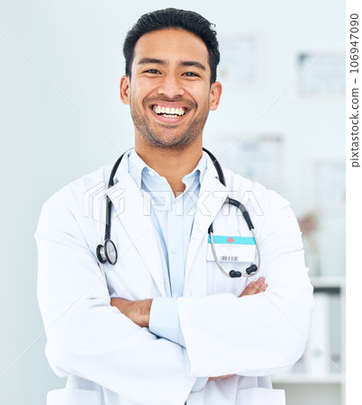 Portrait of doctor with smile, arms crossed and healthcare, professional in hospital for support and help. Medicine, happy man with confidence and pride in medical career, expert surgeon in clinic. Portrait of doctor with smile, arms crossed and healthcare, professional in hospital for support and help. Medicine, happy man with confidence and pride in medical career, expert surgeon in clinic. 106947090