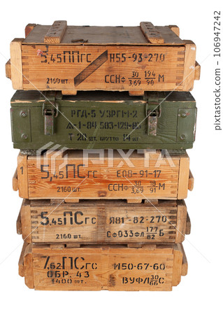 Army ammunition stack of wooden crates. Text in russian - type of ammunition, projectile caliber, projectile type, number of pieces and weight. Army ammunition stack of wooden crates. Text in russian - type of ammunition, projectile caliber, projectile type, number of pieces and weight. 106947242