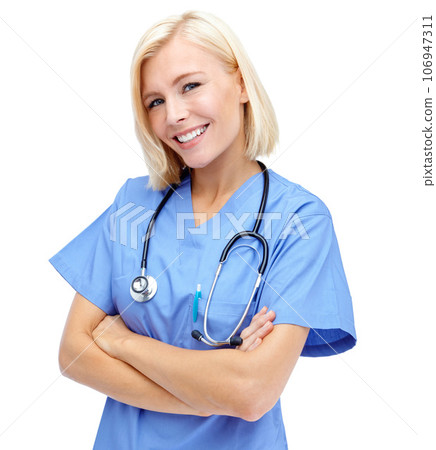 Woman, doctor and smile with arms crossed and stethoscope for healthcare against a white studio background. Portrait of a isolated female medical professional standing and smiling on white background 106947311