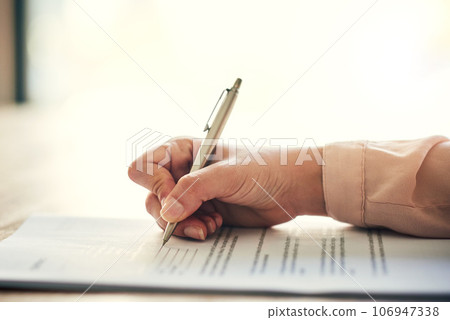 Contract, document and paper work closeup of businesswoman signing, writing or filling out personal information, insurance or job form. Professional reading recruitment paperwork at a hiring company 106947338