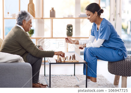 Caregiver, chess or old woman in nursing home for healthcare, problem solving skills or mental health recovery. Relaxing, nurse or focused mature patient thinking of solution or playing board games Caregiver, chess or old woman in nursing home for healthcare, problem solving skills or mental health recovery. Relaxing, nurse or focused mature patient thinking of solution or playing board games 106947725
