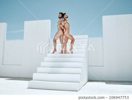 Art, naked men posing in sun together, architecture and blue sky, muscle and athletic lgbt body. Pride, power and gay couple in artistic Greek athlete statue pose, freedom in creative self expression Art, naked men posing in sun together, architecture and blue sky, muscle and athletic lgbt body. Pride, power and gay couple in artistic Greek athlete statue pose, freedom in creative self expression 106947753