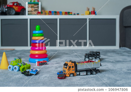 Childrens toys are scattered in room. Childrens toys are scattered in room. 106947806