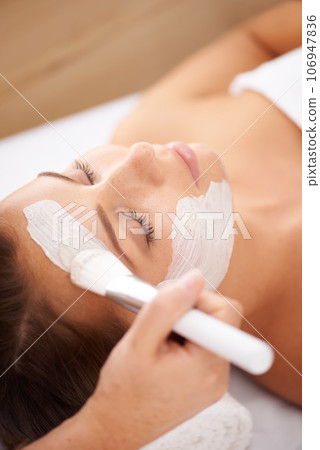 Spa, face mask and woman with cream, dermatology and grooming with skincare, cleanse and detox. Female person, model and lady with organic facial, salon treatment and hygiene for clear and soft skin 106947836